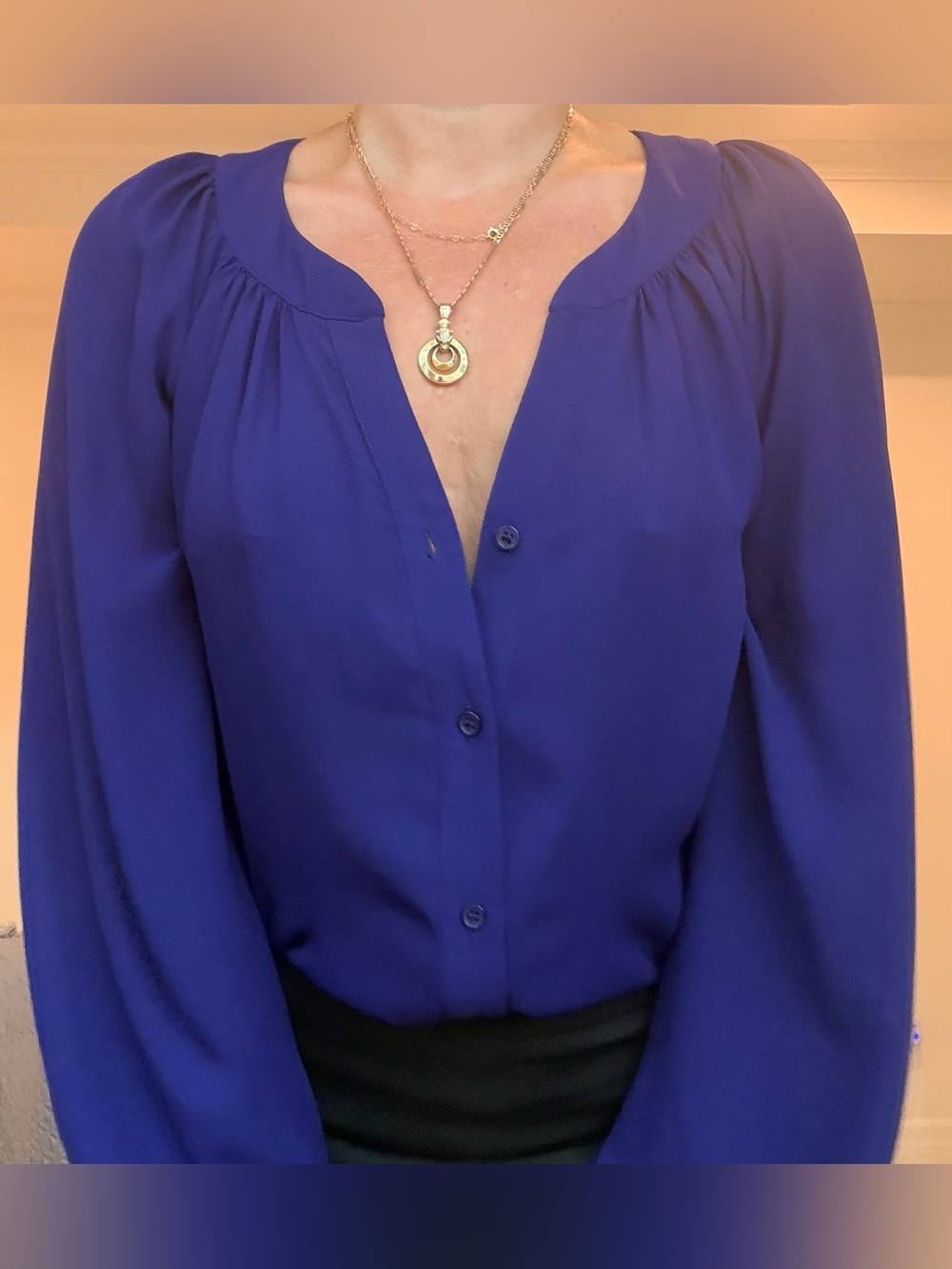 Bellatrix pleat neck long sleeve peasant blouse.